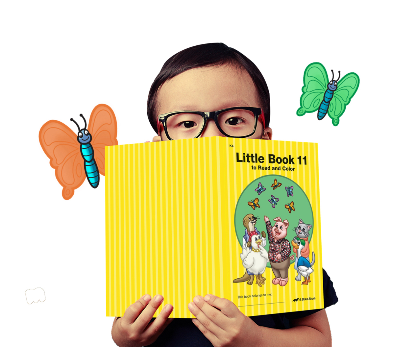 Little boy with book and butterflies