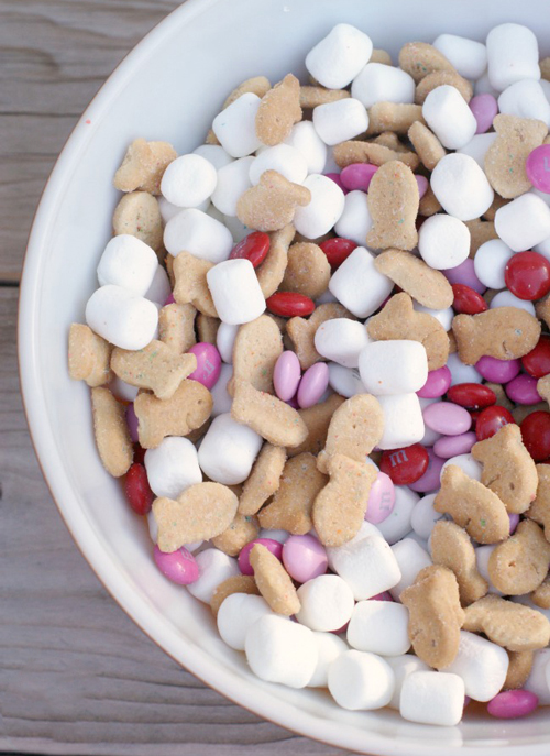 Mini marshmallows, graham cracker fish, and pink and red candy