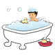 Boy Taking a Bath with shampoo bubbles, a duck, and a boat