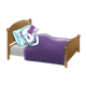 Amber Lamb asleep in a purple and white bed