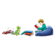 Boy in Beanbag Chair with toys and books