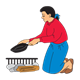 Lady preparing to cook outdoors