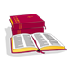 Open Red Bible beside a stack of red Bibles