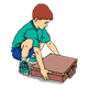 Boy in Green Shirt lifting briefcase